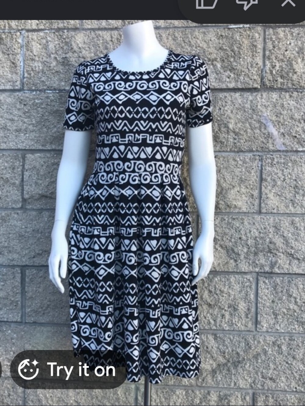 LuLaRoe Amelia dress features a black and white geometric tribal pattern